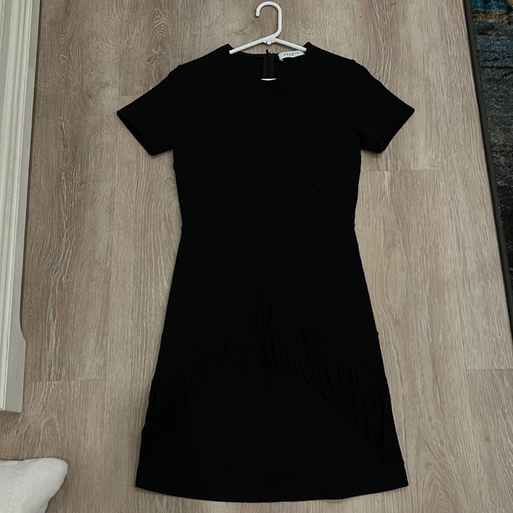 Black dress with tassels